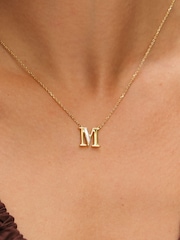 Inicio Gold Tone Mother of Pearl M Initial Pendant - Image 1 of 4