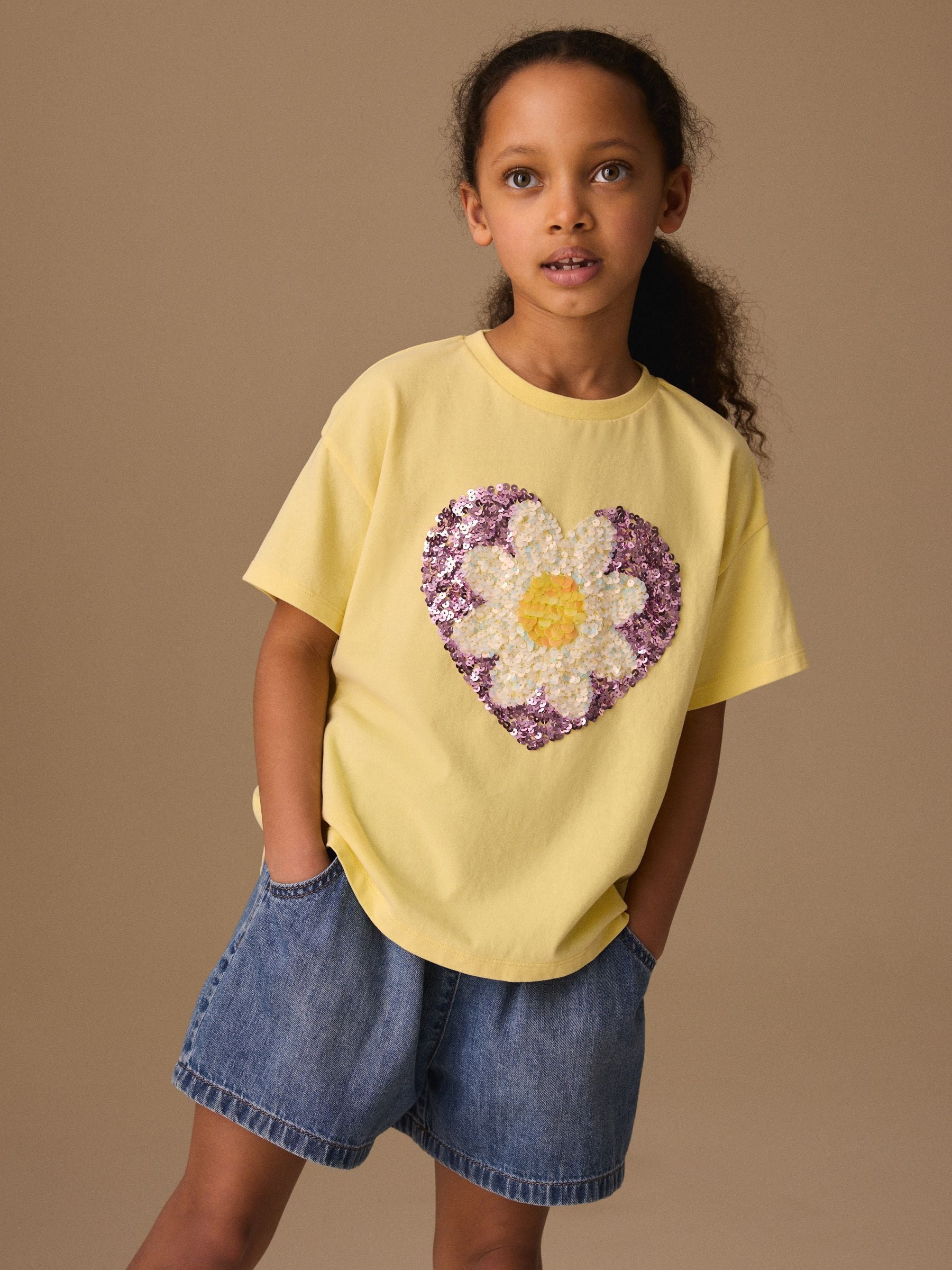 Buy Yellow Daisy Sequin Heart T-Shirt (3-16yrs) from Next Romania