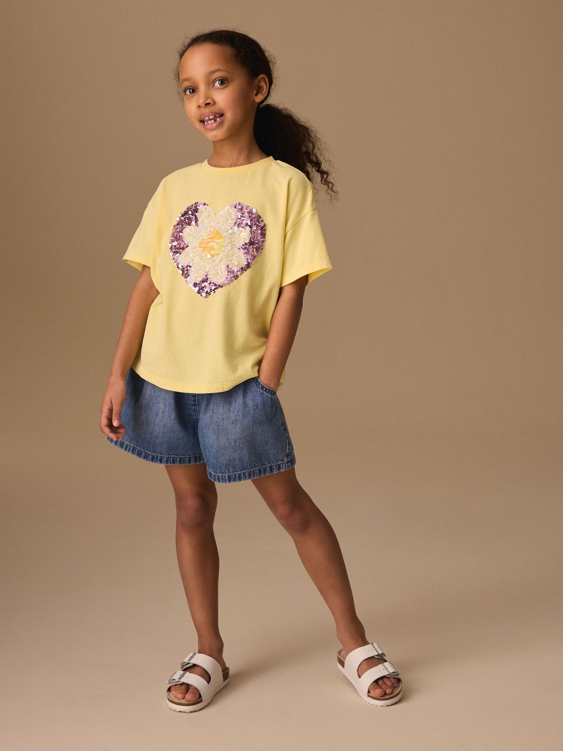 Buy Yellow Daisy Sequin Heart T-Shirt (3-16yrs) from Next Romania
