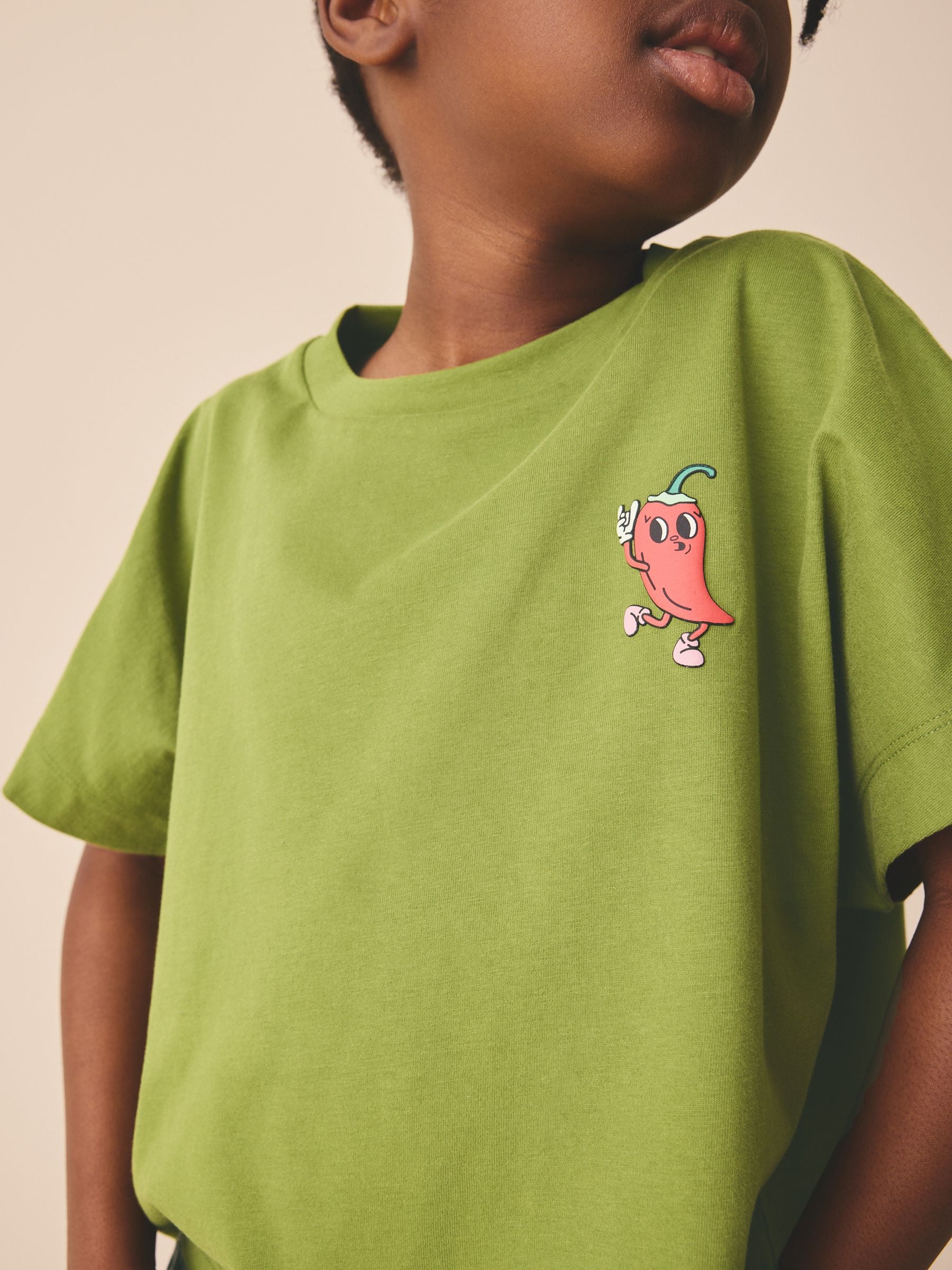 Buy Green Chilli Boxy Graphic T-Shirt (3-16yrs) from the Next UK