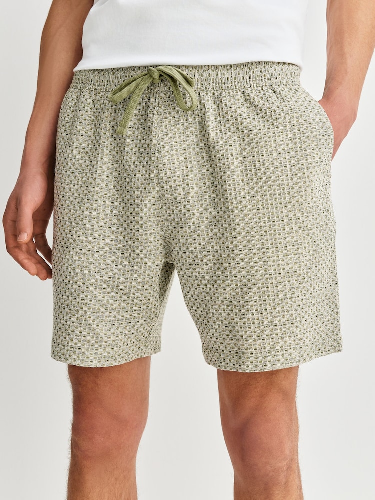 Salbeigrün - Shorts mit Waffelstruktur und Kordelzugbund - Bild 1 von 10
