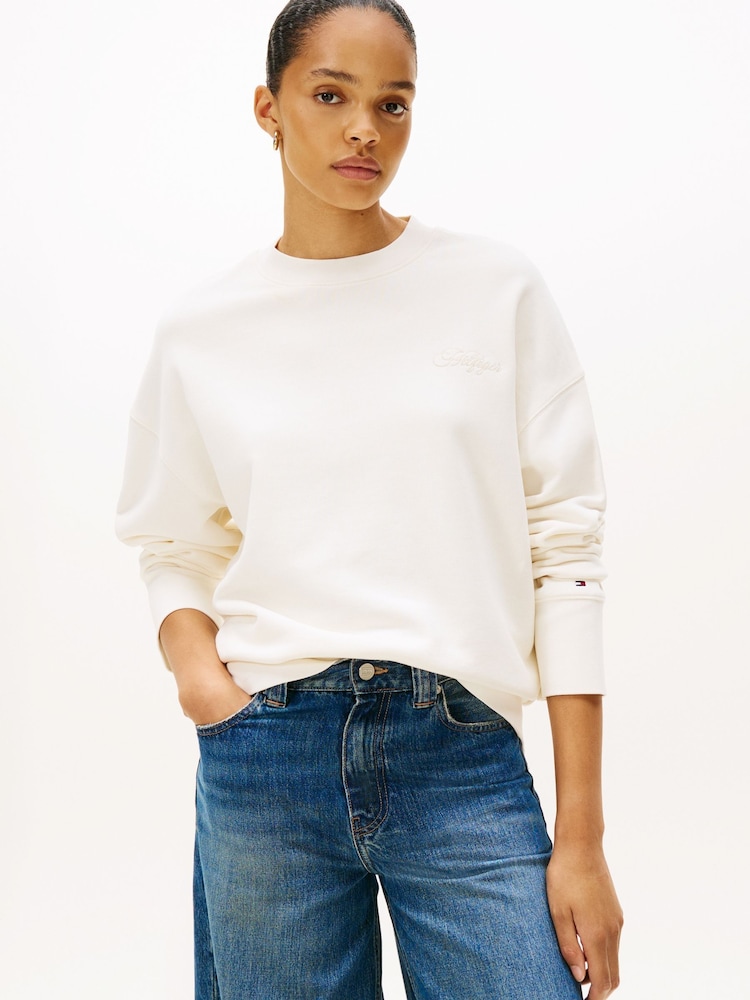 Tommy Hilfiger White Logo Embroidery Relaxed Fit Sweatshirt - Image 1 of 5 Tommy Hilfiger White Logo Embroidery Relaxed Fit Sweatshirt - Image 1 of 5