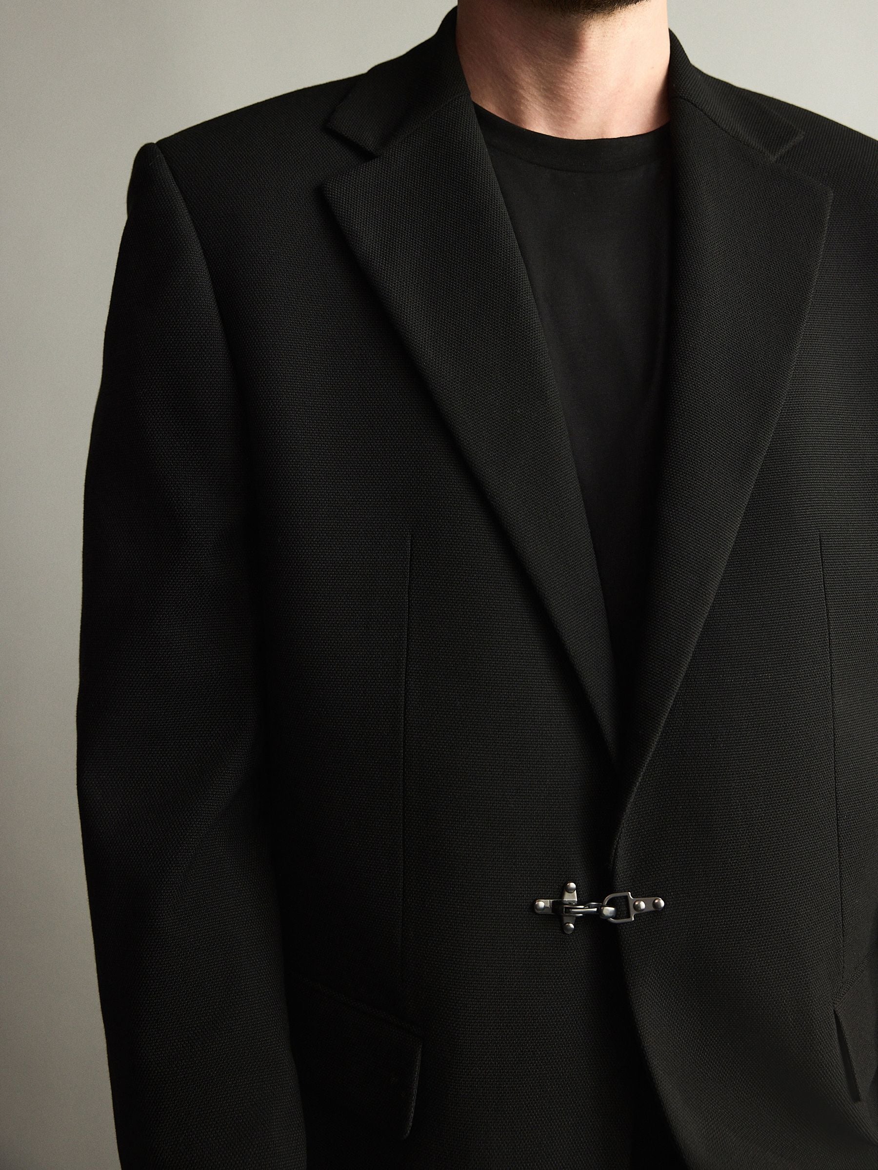 Buy Black Loose Fit Textured Suit Jacket With Fireman Clasp Metal