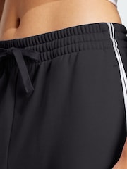 adidas Essentials 3-Stripes French Terry Cuffed Joggers - Imagem 3 de 5
