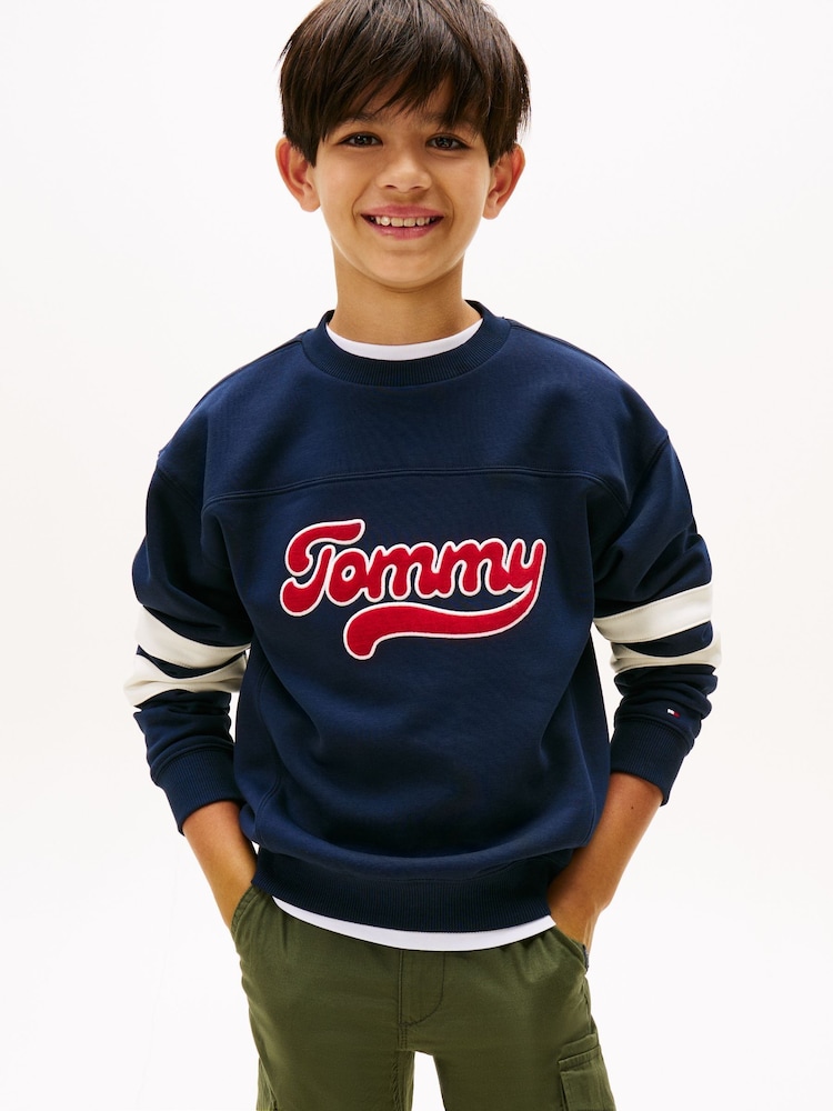 Tommy Hilfiger Blue Varsity Back Logo Colour-Blocked Sweattop - Image 1 of 5 Tommy Hilfiger Blue Varsity Back Logo Colour-Blocked Sweattop - Image 1 of 5