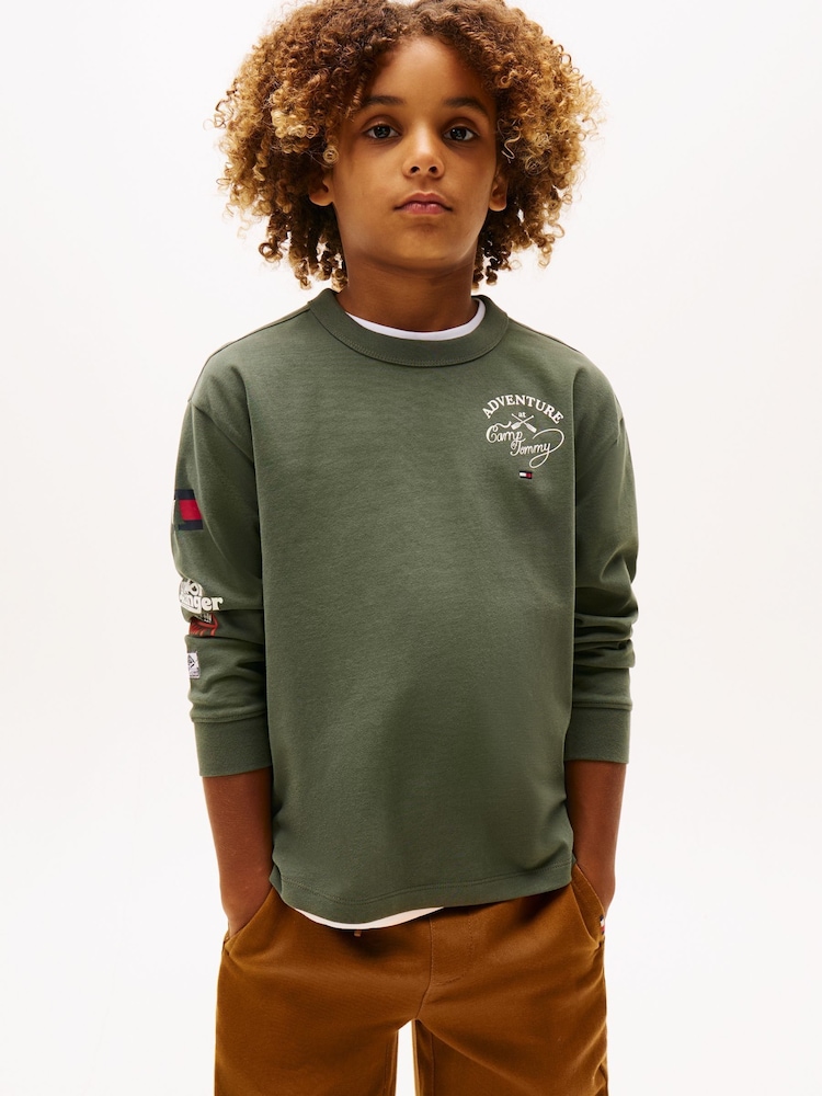 Tommy Hilfiger Green Multi-Badge Long Sleeve T-Shirt - Image 1 of 5 Tommy Hilfiger Green Multi-Badge Long Sleeve T-Shirt - Image 1 of 5