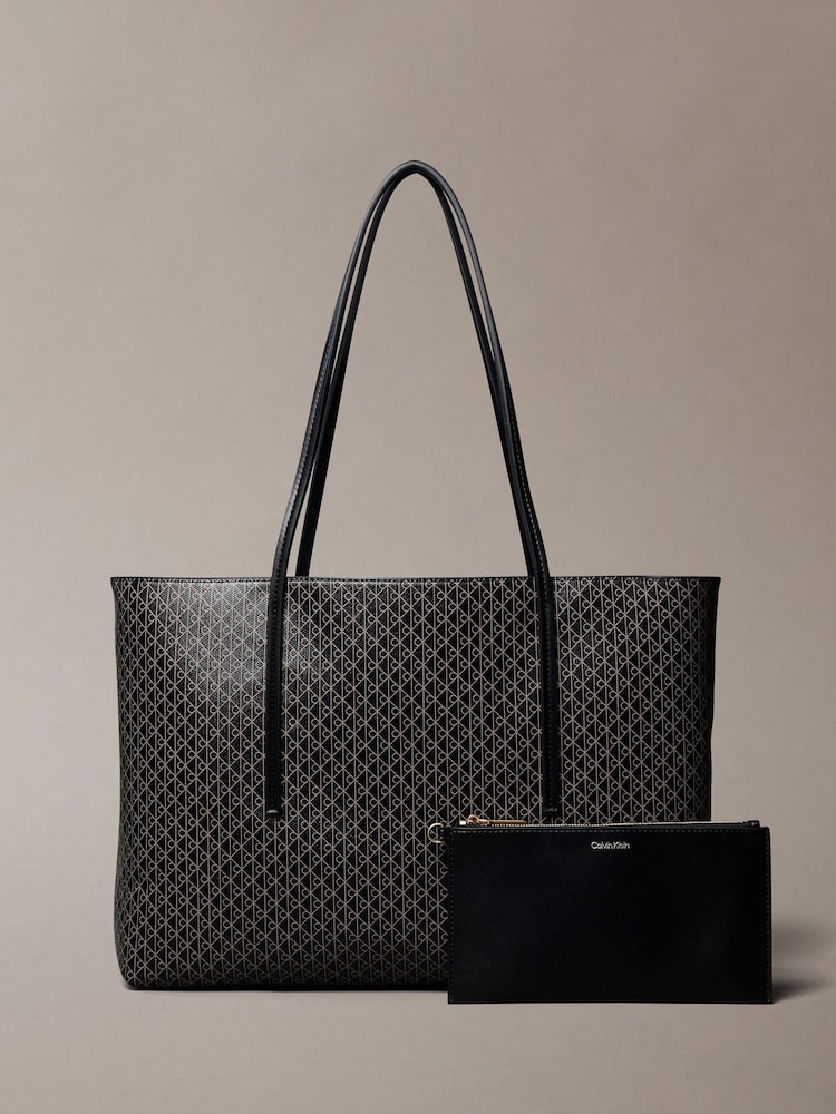 Calvin Klein Black Allover Monogram Logo Tote Bag with Pouch - Image 1 of 4 Calvin Klein Black Allover Monogram Logo Tote Bag with Pouch - Image 1 of 4