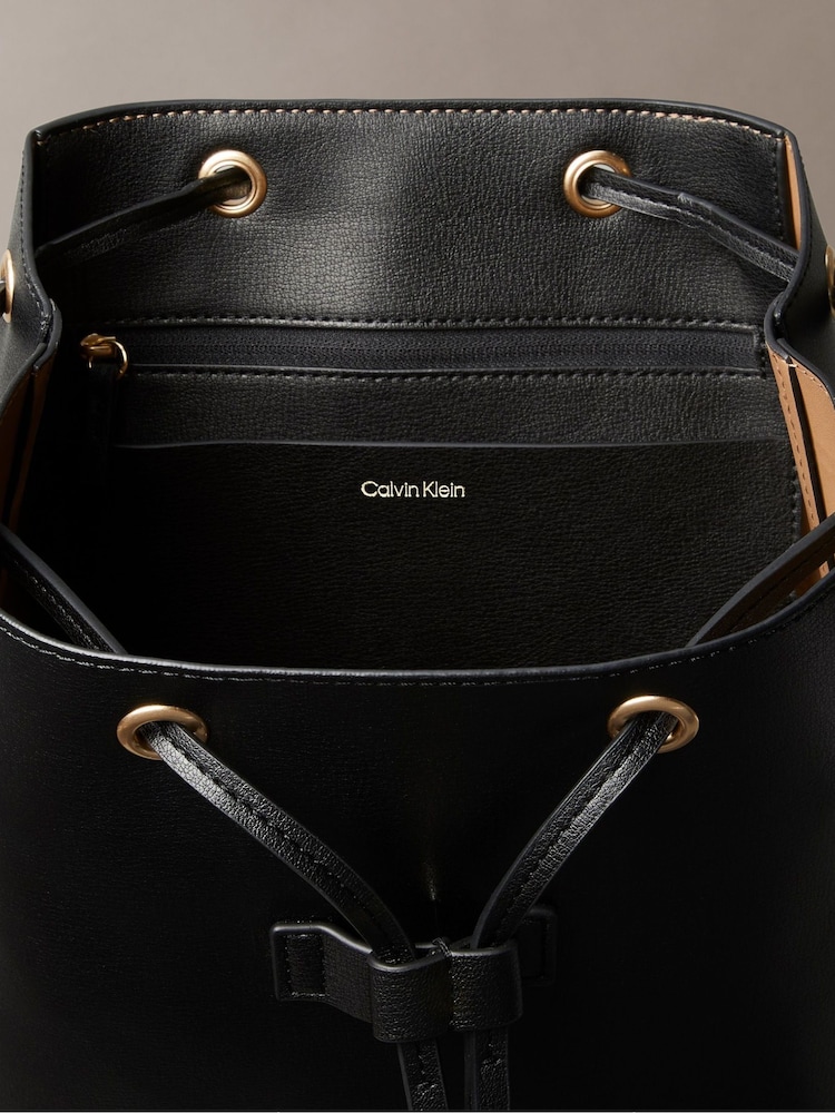 Calvin Klein Black Foil Logo Flap Backpack - Image 2 of 2 Calvin Klein Black Foil Logo Flap Backpack - Image 2 of 2