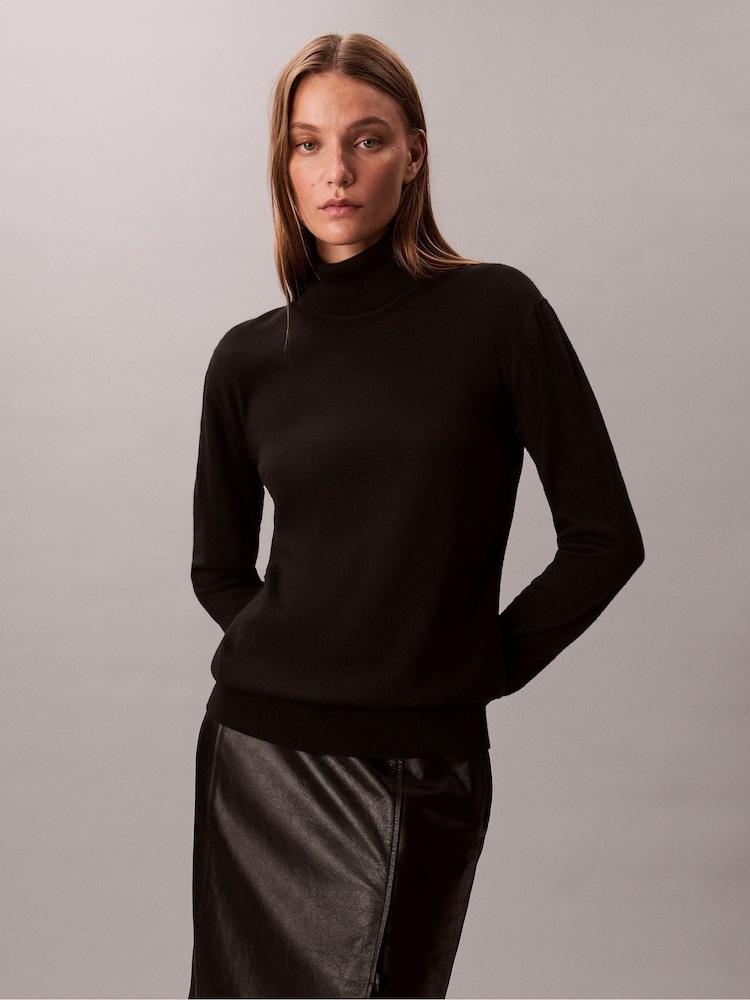 Calvin Klein Black Merino Roll Neck Jumper - Image 1 of 7 Calvin Klein Black Merino Roll Neck Jumper - Image 1 of 7