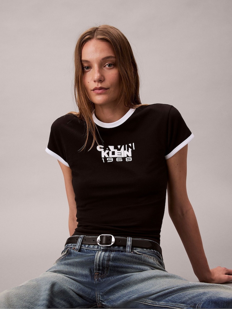 Calvin Klein Black 1968 Logo Graphic Baby T-Shirt - Image 1 of 5 Calvin Klein Black 1968 Logo Graphic Baby T-Shirt - Image 1 of 5