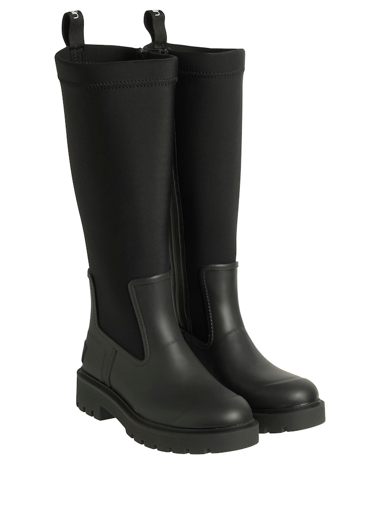 Calvin Klein Black Tall Heeled Flexible Lug Sole Rainboots - Image 1 of 2 Calvin Klein Black Tall Heeled Flexible Lug Sole Rainboots - Image 1 of 2