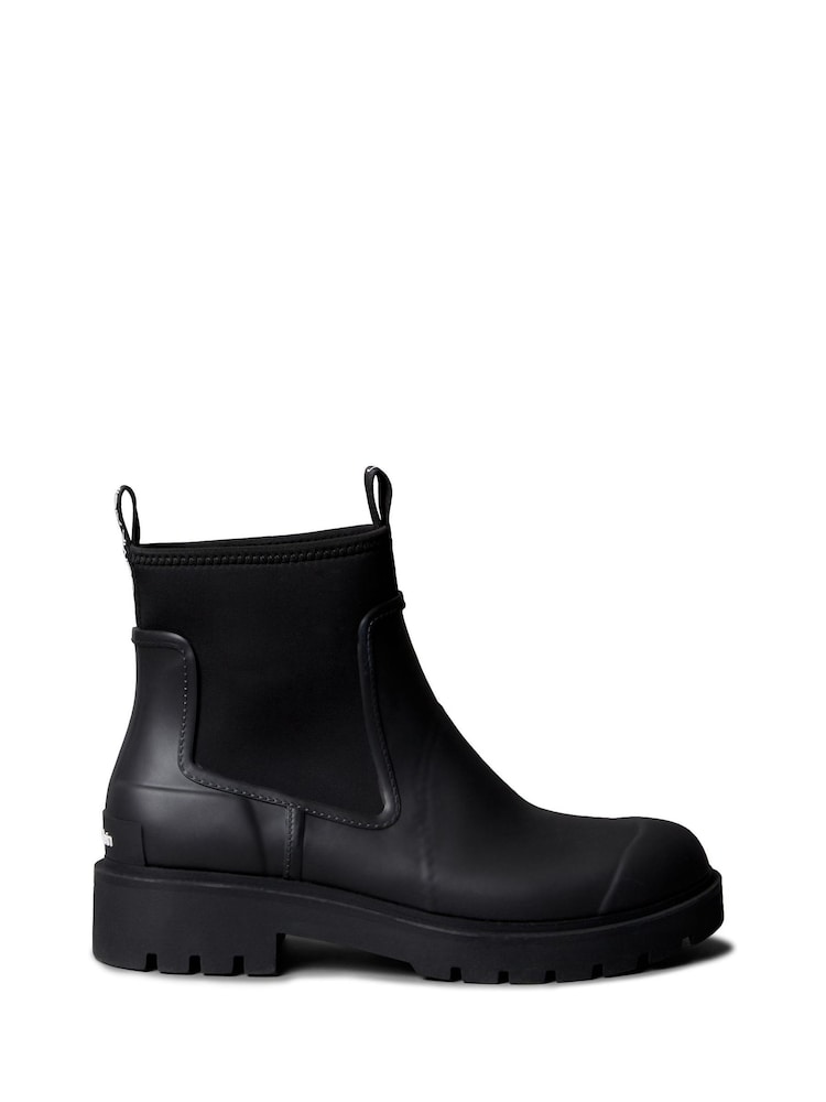 Calvin Klein Black Heeled Flexible Lug Sole Rain Boots - Image 1 of 6 Calvin Klein Black Heeled Flexible Lug Sole Rain Boots - Image 1 of 6