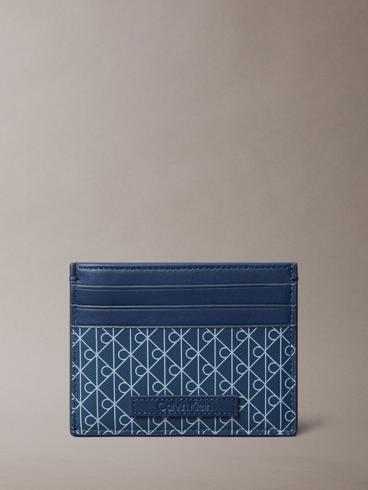 Calvin Klein Blue Allover Monogram Logo Card Holder - Image 1 of 4 Calvin Klein Blue Allover Monogram Logo Card Holder - Image 1 of 4