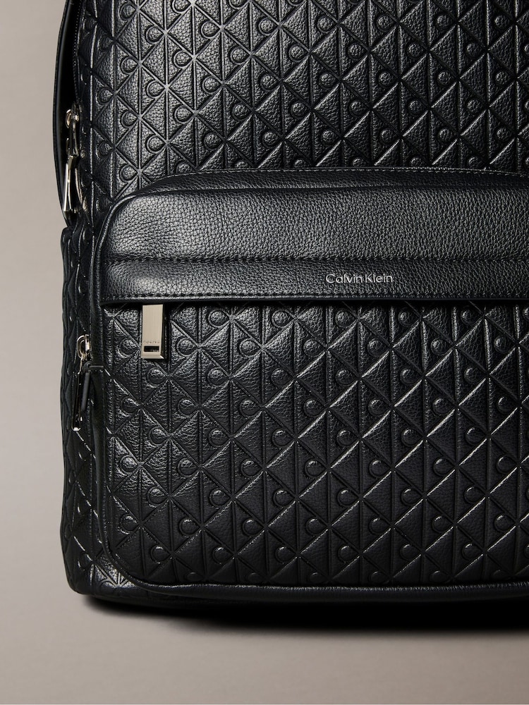 Calvin Klein Black Embossed Allover Monogram Backpack - Image 4 of 4 Calvin Klein Black Embossed Allover Monogram Backpack - Image 4 of 4