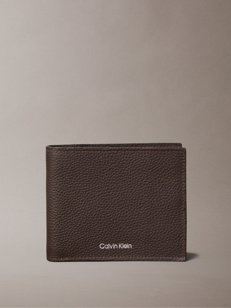 Calvin Klein Brown Foil Embossed Logo Bifold Wallet - Image 1 of 3 Calvin Klein Brown Foil Embossed Logo Bifold Wallet - Image 1 of 3