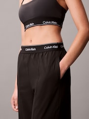 Spodnji del trenirke s širokimi hlačnicami Calvin Klein Performance - Slika 6 iz 6