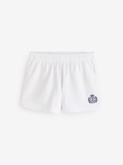 Sporty & Rich White NY Crest Embroidered Disco Shorts - Image 1 of 4