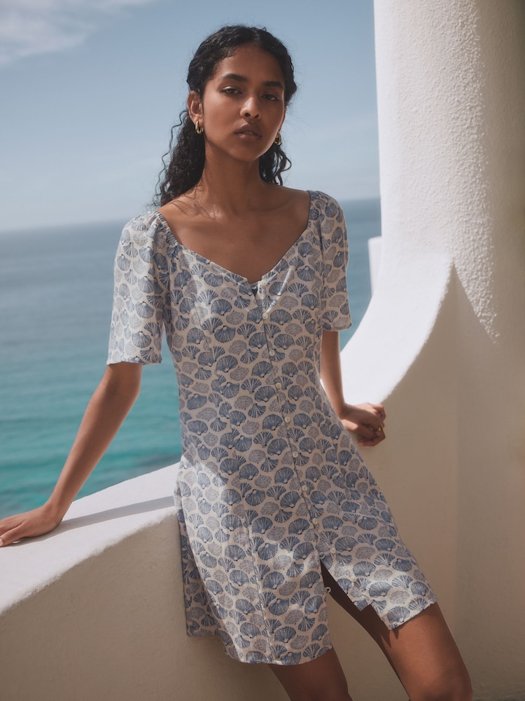 White/Blue Shell Print Flutter Sleeve Mini Dress - Image 1 of 7 White/Blue Shell Print Flutter Sleeve Mini Dress - Image 1 of 7