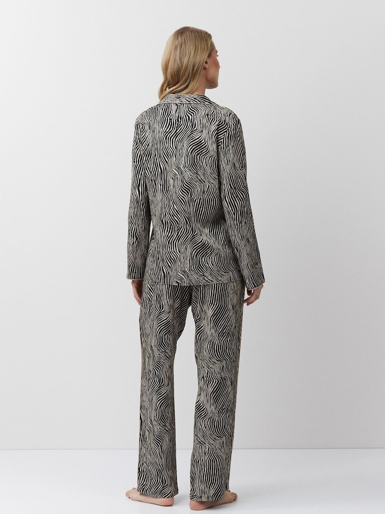 Aruelle Linna elegant Animal print Long Leg Pyjamas set with Beige piping detail. - Image 6 of 6 Aruelle Linna elegant Animal print Long Leg Pyjamas set with Beige piping detail. - Image 6 of 6