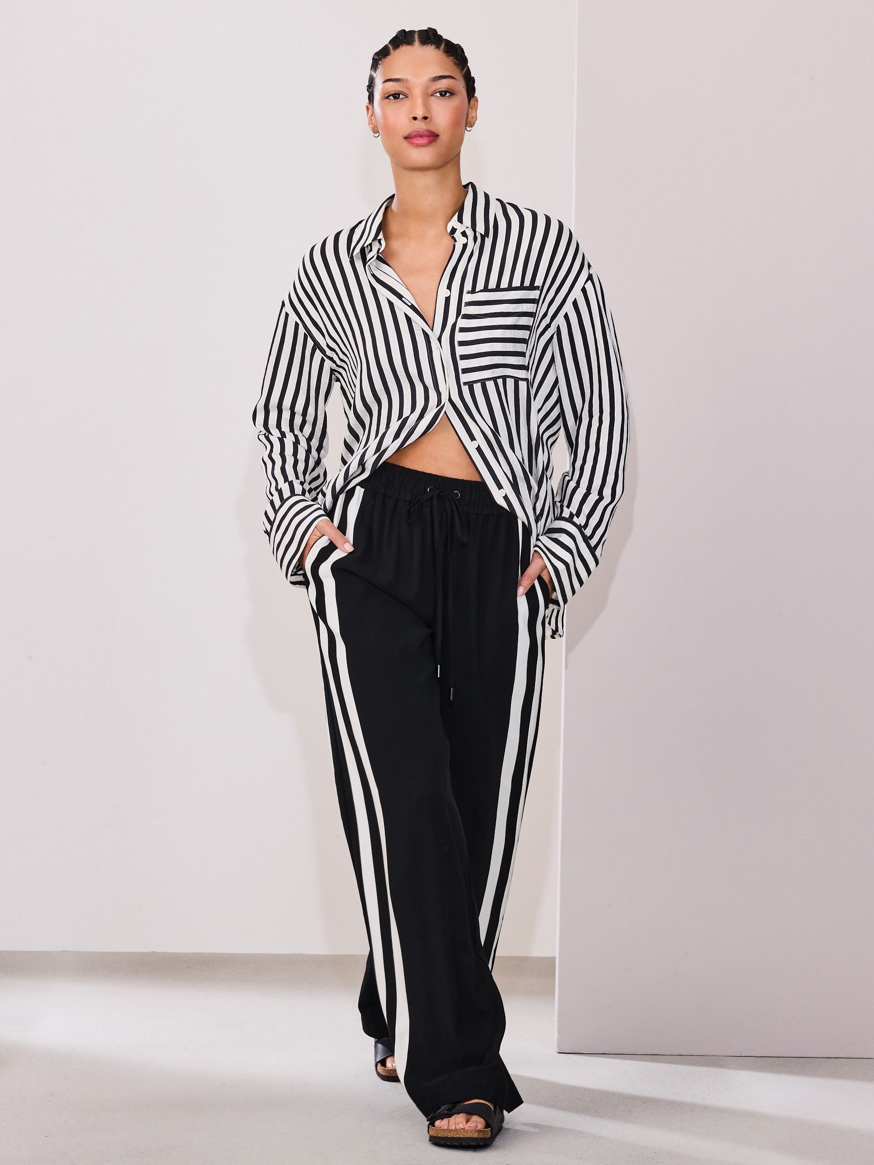 Buy Black Wide Leg Side Stripe Trousers from Next USA