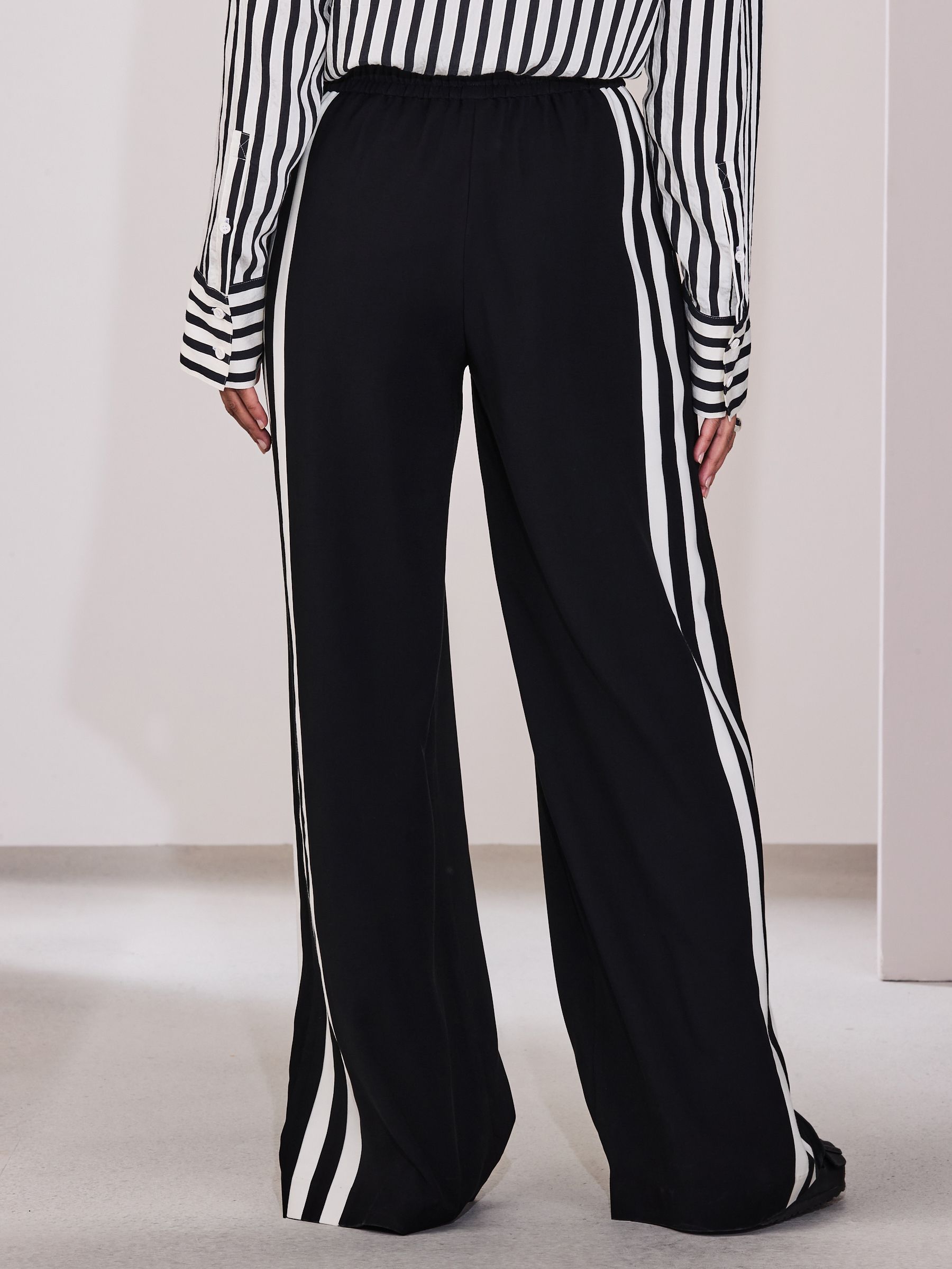 Buy Black Wide Leg Side Stripe Trousers from Next USA