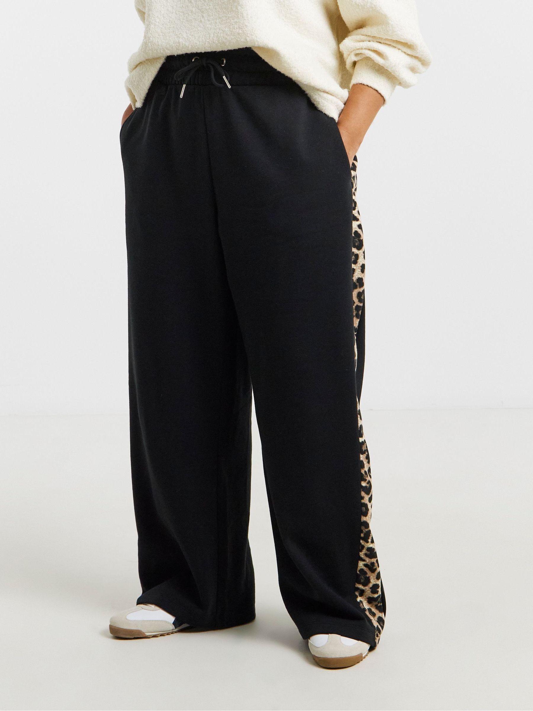 Buy Simply Be Animal Print Wide Leg Side Stripe Joggers from Next USA