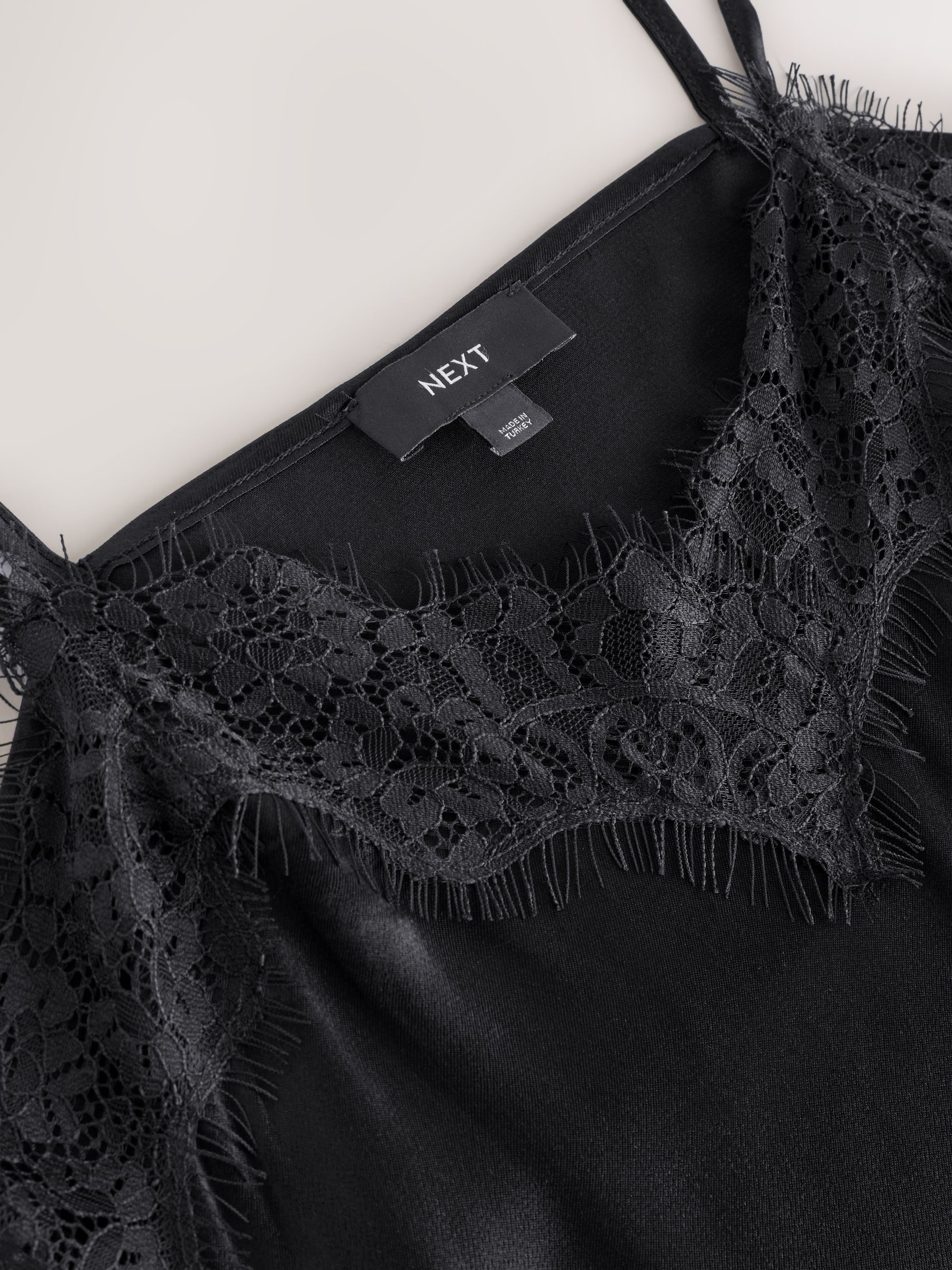 Buy Black Asymetric Satin Lace Trim Cami Top from Next USA