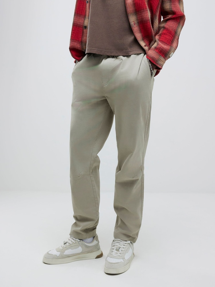 Buy River Island Natural Pull On Straight Fit Joggers from the