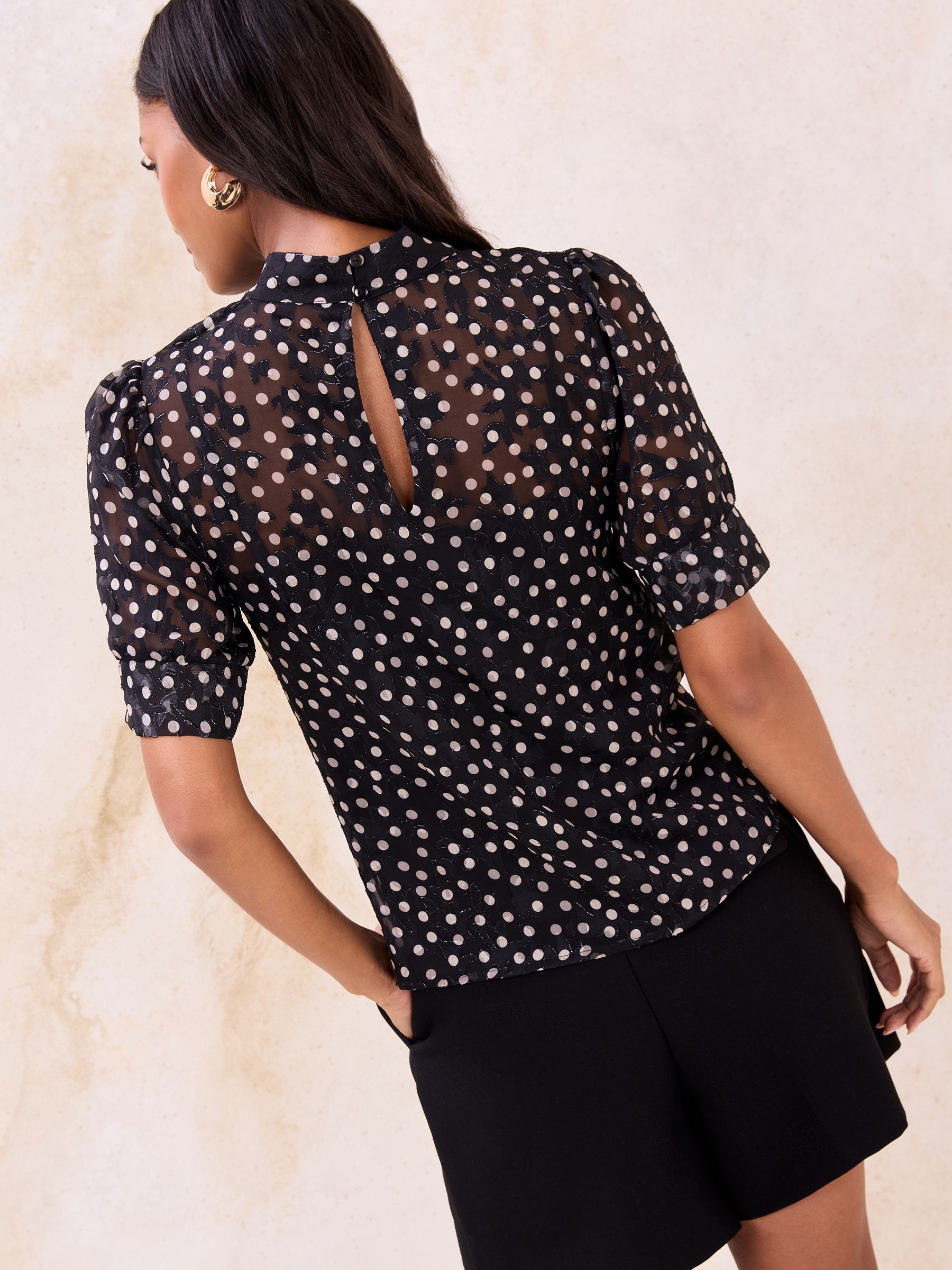 Buy Lipsy Black Polka Dot Puff Sleeve Top from the Next UK online shop