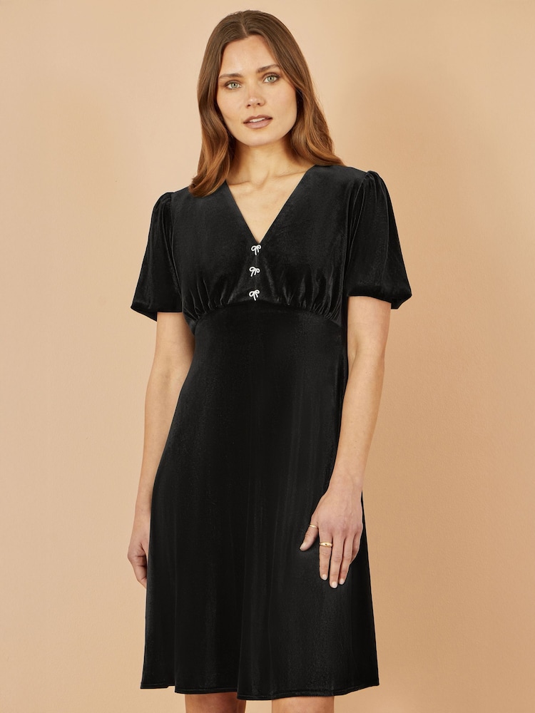 Yumi Black Velvet Skater Dress With Dimante Bow Detail - Image 1 of 4 Yumi Black Velvet Skater Dress With Dimante Bow Detail - Image 1 of 4