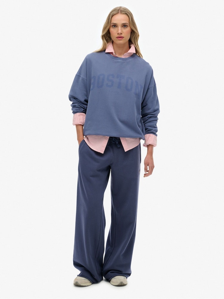 Superdry Blue Athletic Essentials Relaxed Crew Sweattop - Image 1 of 5 Superdry Blue Athletic Essentials Relaxed Crew Sweattop - Image 1 of 5