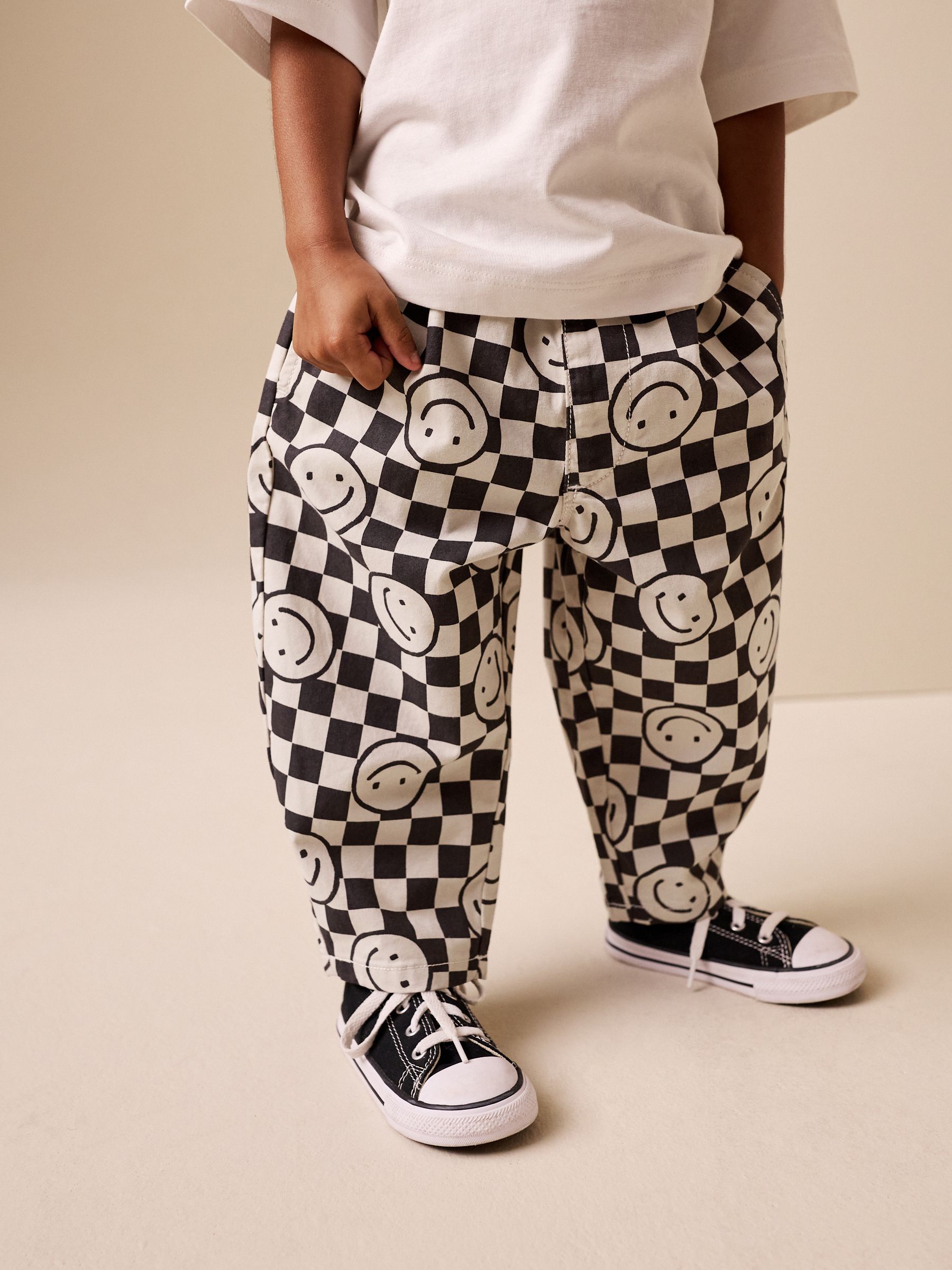 house on the hill pants（checker）　90 Buy Black/Neutral Happy Face Checkerboard Barrel Pull On Trousers
