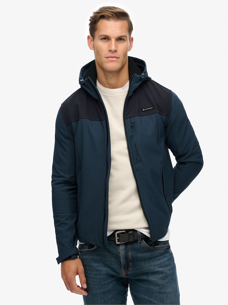 Superdry Blue Hooded Soft Shell Trekker Jacket - Image 1 of 6 Superdry Blue Hooded Soft Shell Trekker Jacket - Image 1 of 6
