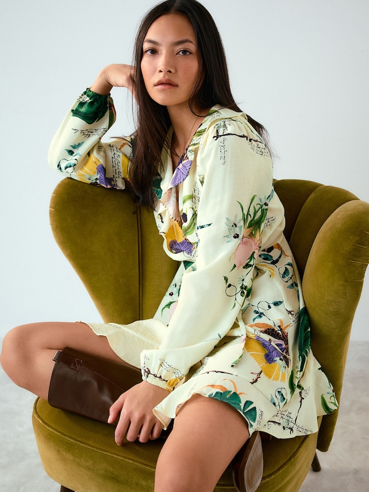 Kew Collection Yellow Floral Print - Long Sleeve Mini Wrap Dress - Slika 1 od 5 Kew Collection Yellow Floral Print - Long Sleeve Mini Wrap Dress - Slika 1 od 5
