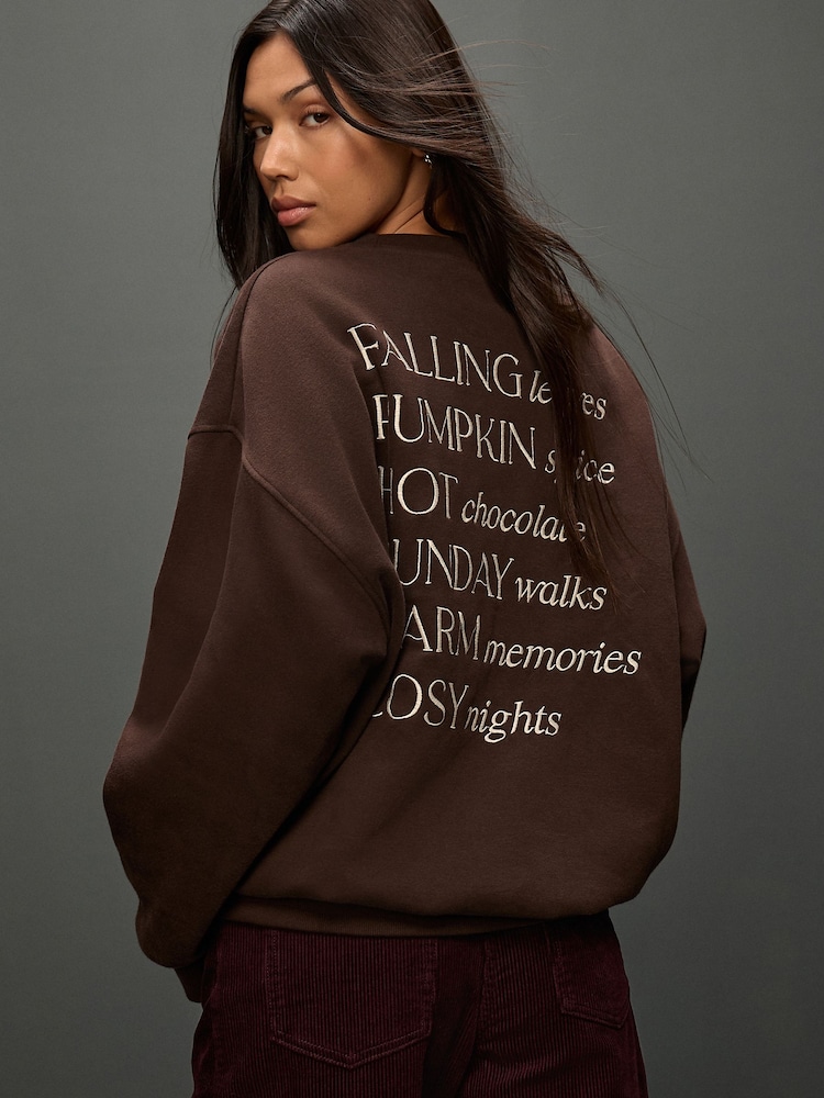 Chocolate Brown Autumnal NYC Embroidered Relaxed Fit Sweatshirt - Image 1 of 5 Chocolate Brown Autumnal NYC Embroidered Relaxed Fit Sweatshirt - Image 1 of 5
