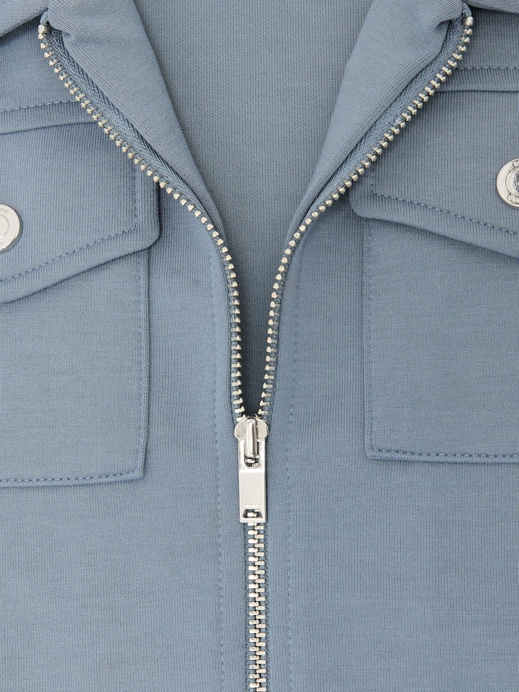 قميص علوي من نسيج جيرسيه متداخل بسحّاب كامل تشكيلة Medina من Reiss - صورة 5 من 5 قميص علوي من نسيج جيرسيه متداخل بسحّاب كامل تشكيلة Medina من Reiss - صورة 5 من 5