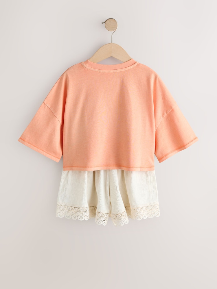 برتقالي/كريمي بنقشة فراشة - طقم من تيشِرت وشورت بارز الملمس (3-16 سنة) - صورة 7 من 7 برتقالي/كريمي بنقشة فراشة - طقم من تيشِرت وشورت بارز الملمس (3-16 سنة) - صورة 7 من 7