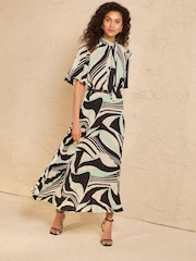 Love & Roses Black Abstract Tie Neck Pleated Midi Dress - Image 1 of 4
