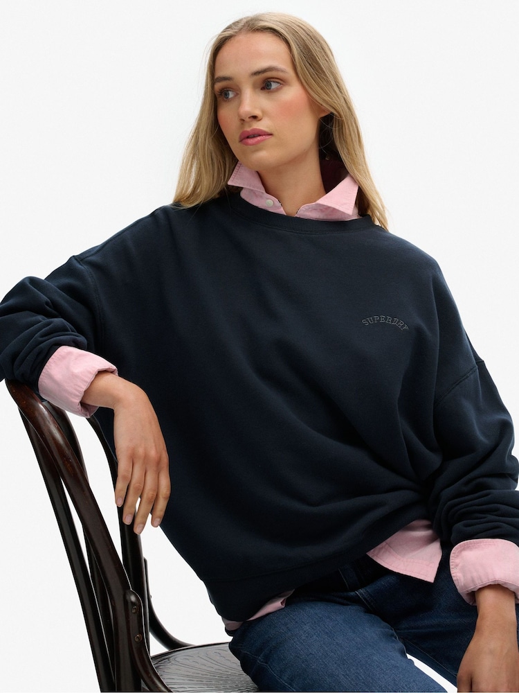 Superdry Blue Essential Logo Garment Dyed Crew Sweatshirt - Image 1 of 7 Superdry Blue Essential Logo Garment Dyed Crew Sweatshirt - Image 1 of 7