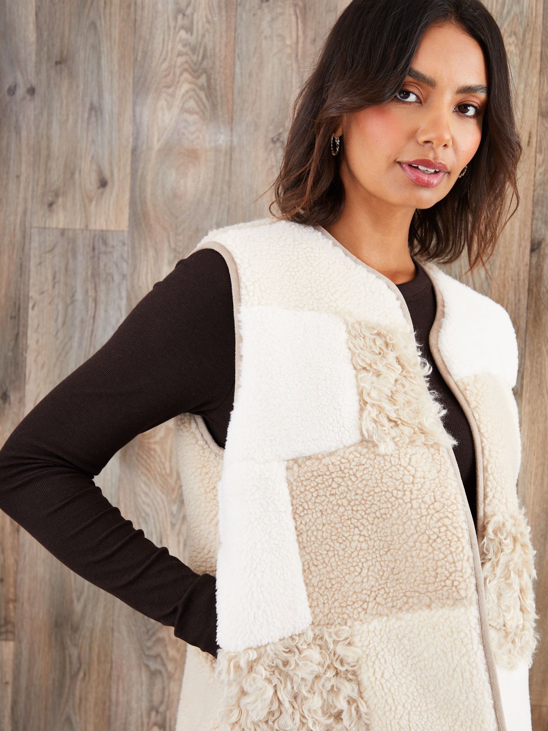 Buy Threadbare Cream Patchwork Borg Gilet from Next Canada