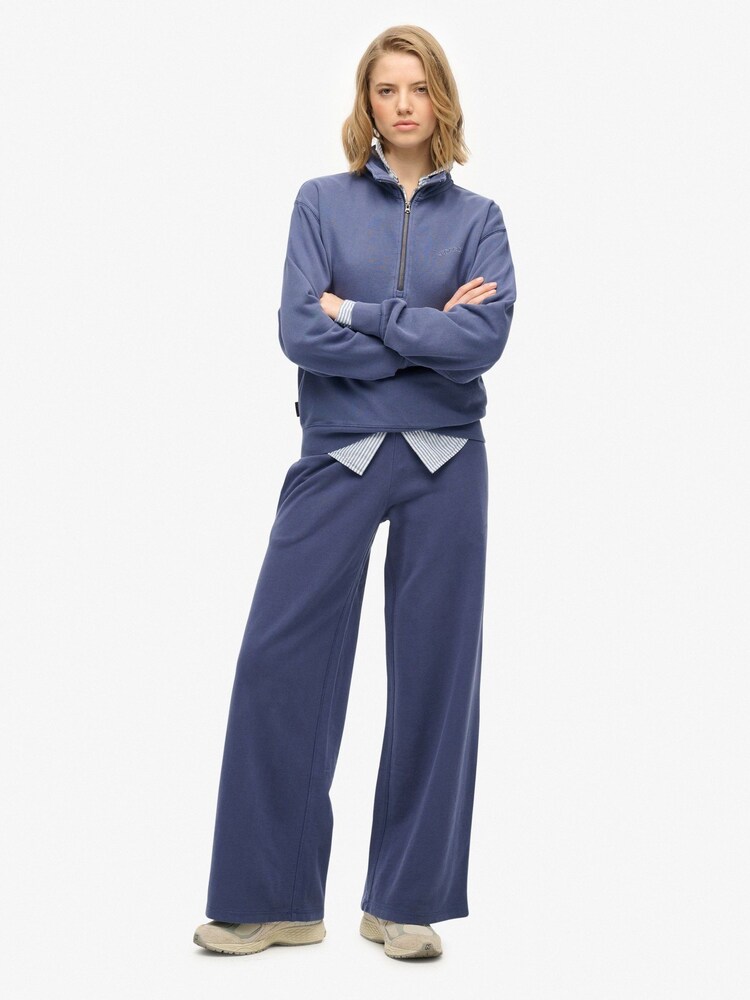 Superdry Blue Athletic Essentials Logo Garment Dyed Joggers - Image 1 of 8 Superdry Blue Athletic Essentials Logo Garment Dyed Joggers - Image 1 of 8