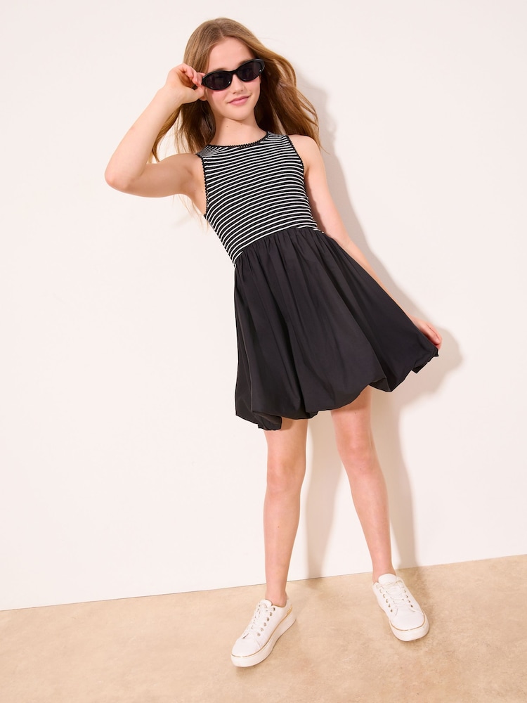 Lipsy Black/White 2-in-1 Striped Puffball Dress (5-16yrs) - Image 1 of 4