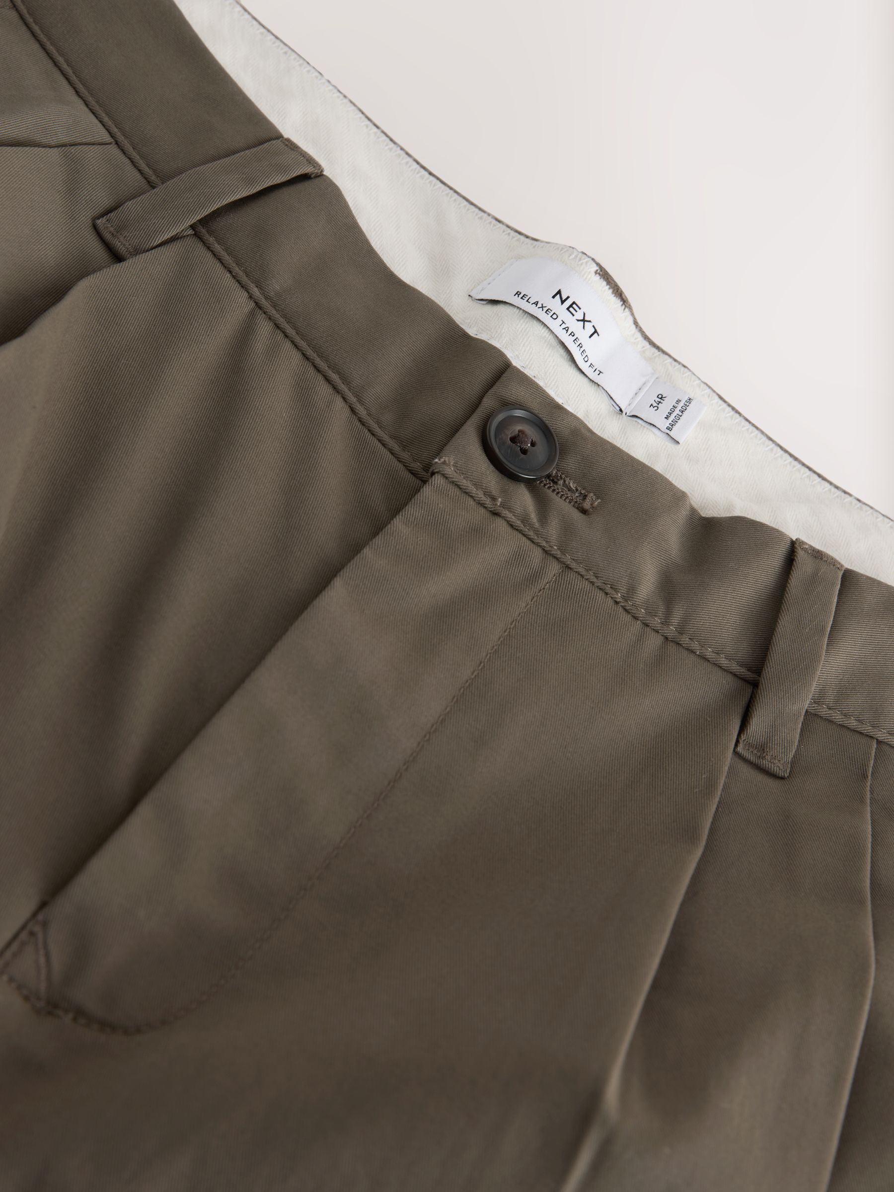 Buy Sand Relaxed Tapered Fit Cotton Rich Stretch Chinos from Next