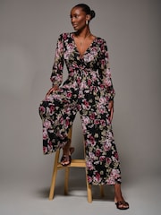 Jolie Moi Chrome Black Lace Wrap Tie Waist Long Sleeve Jumpsuit - Image 1 of 6