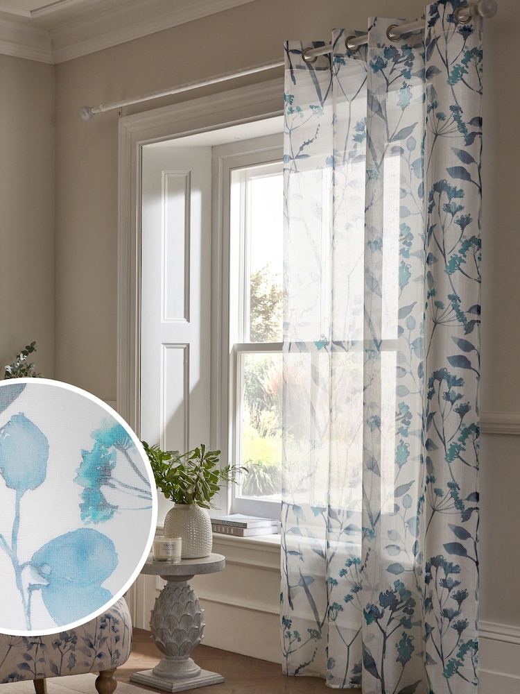 Blue Isla Floral Printed Eyelet Unlined Sheer Panel Voile Curtains - Image 1 of 5 Blue Isla Floral Printed Eyelet Unlined Sheer Panel Voile Curtains - Image 1 of 5