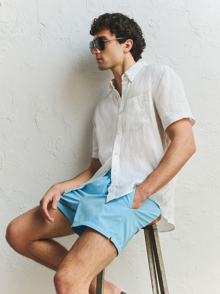 Light Blue Essential 4 Inch Swim Shorts - Image 1 of 5 Light Blue Essential 4 Inch Swim Shorts - Image 1 of 5