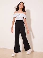 Lipsy Black/White Polka Dot Bow Bardot Jumpsuit (7-16yrs) - Image 4 of 5