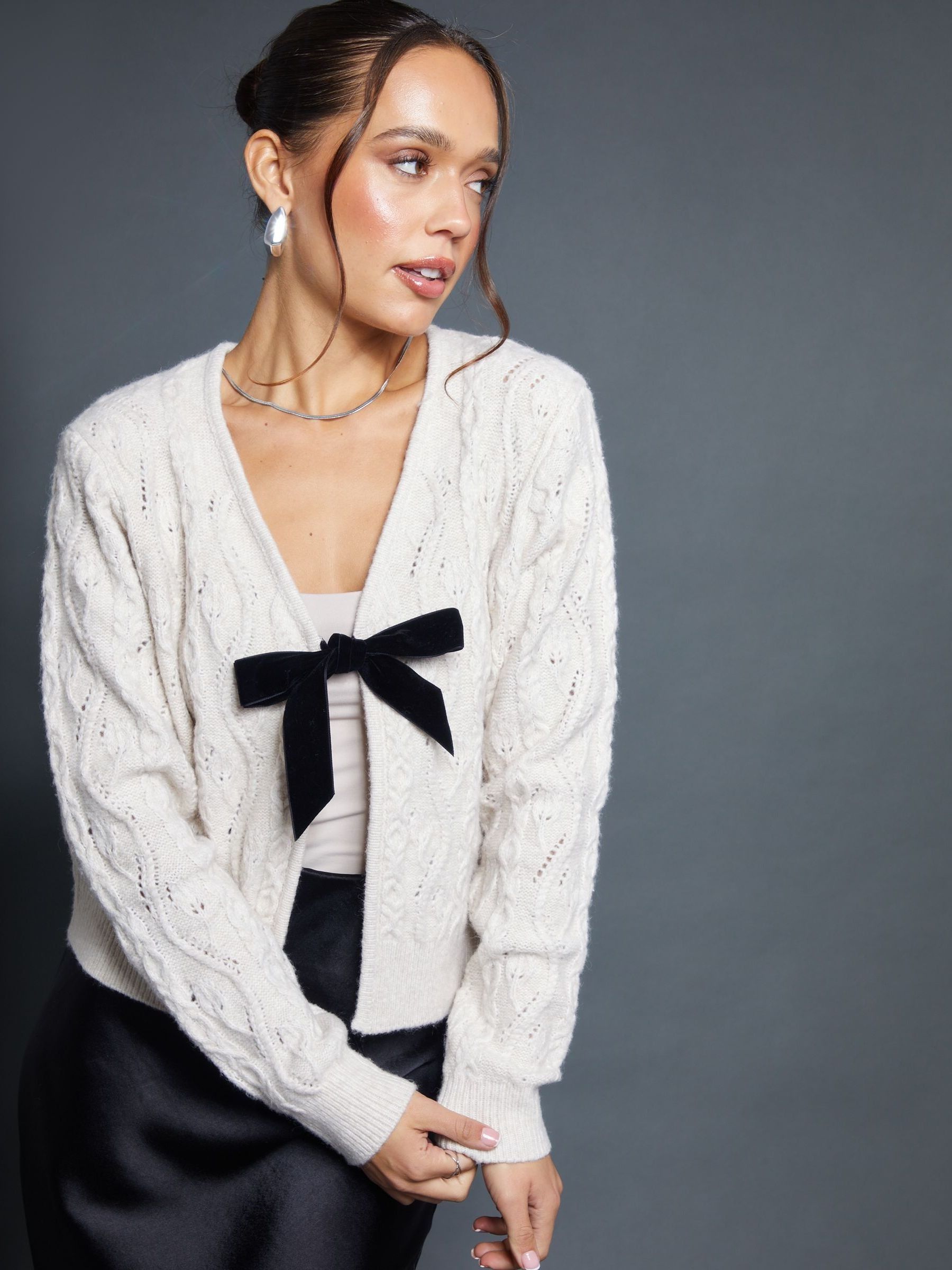 Buy Threadbare Cream Cable Knit Velvet Bow Detail Cardigan from