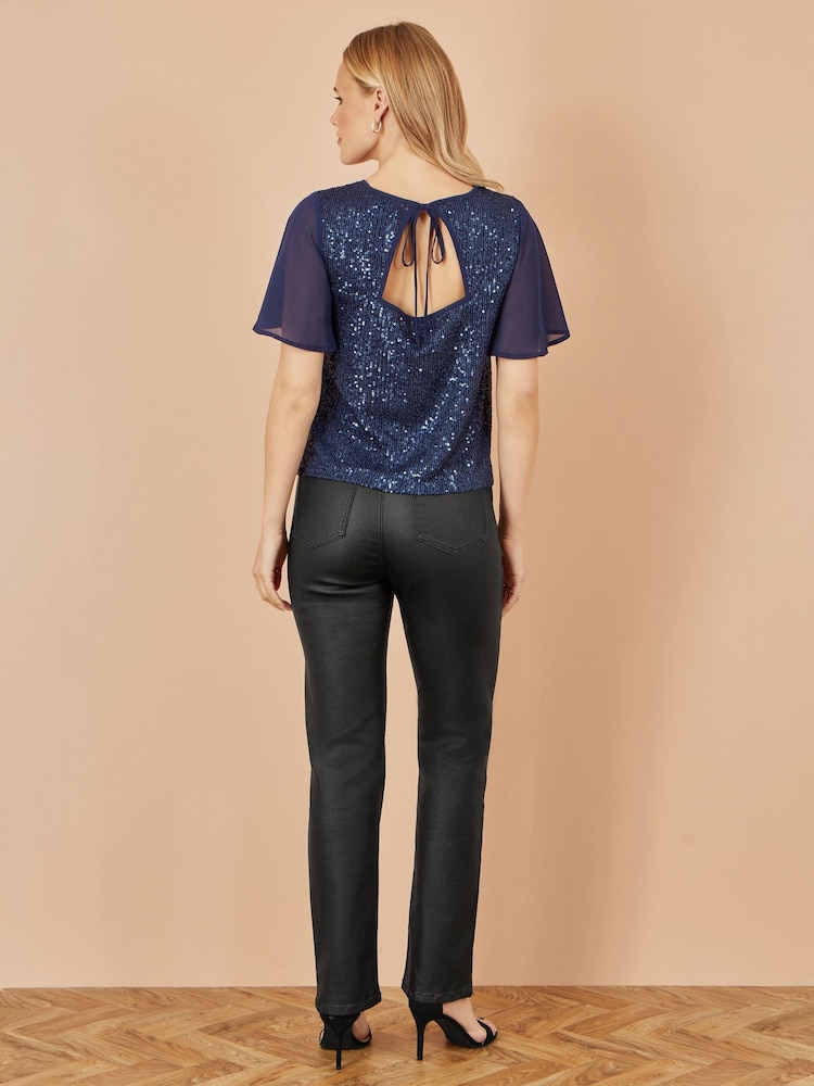 Yumi Blue Sequin Top With Sheer Sleeves And Cut Out Back - Image 4 of 4 Yumi Blue Sequin Top With Sheer Sleeves And Cut Out Back - Image 4 of 4