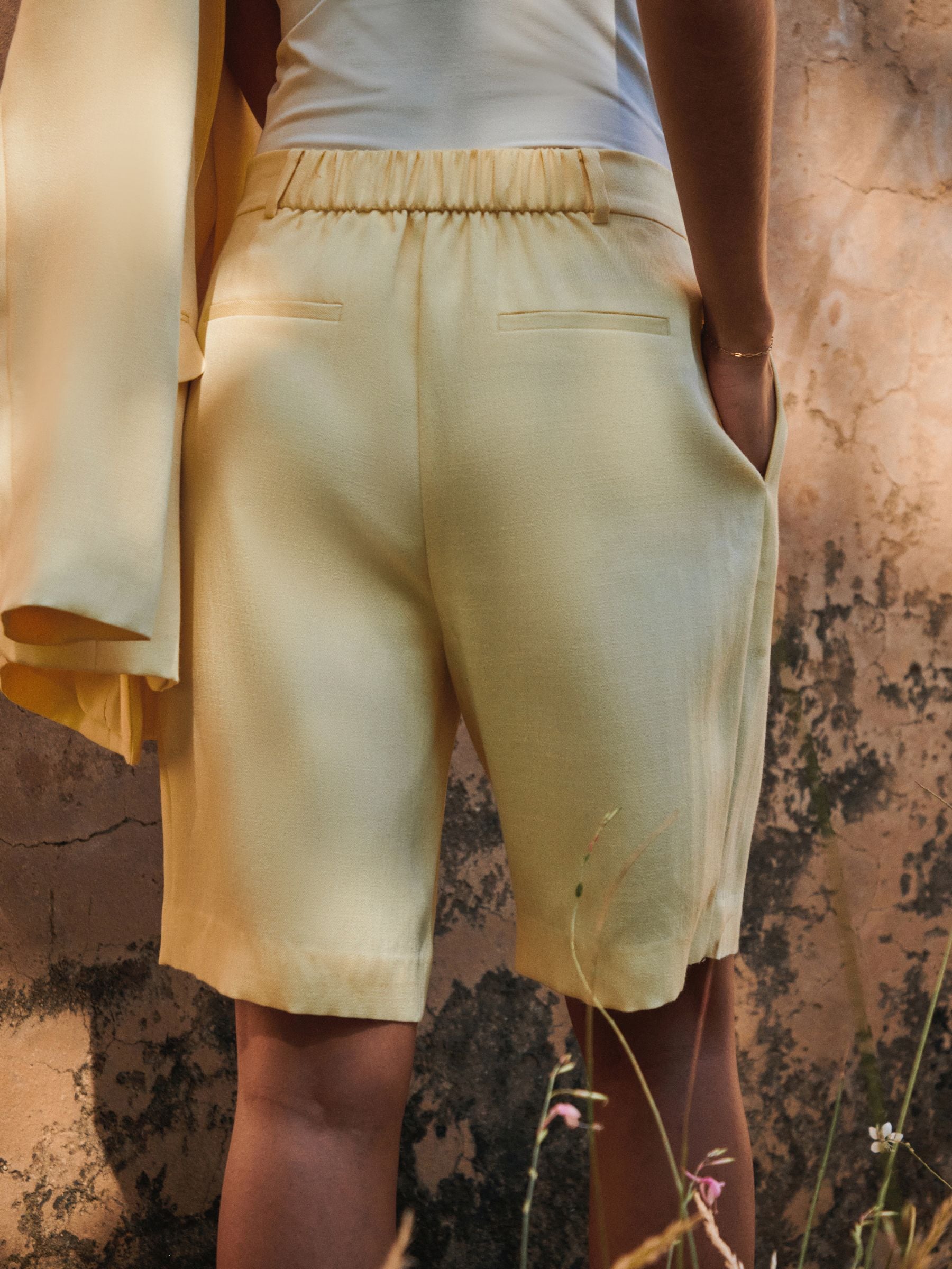Buy Yellow Crinkle Tailored Bermuda Shorts from Next USA